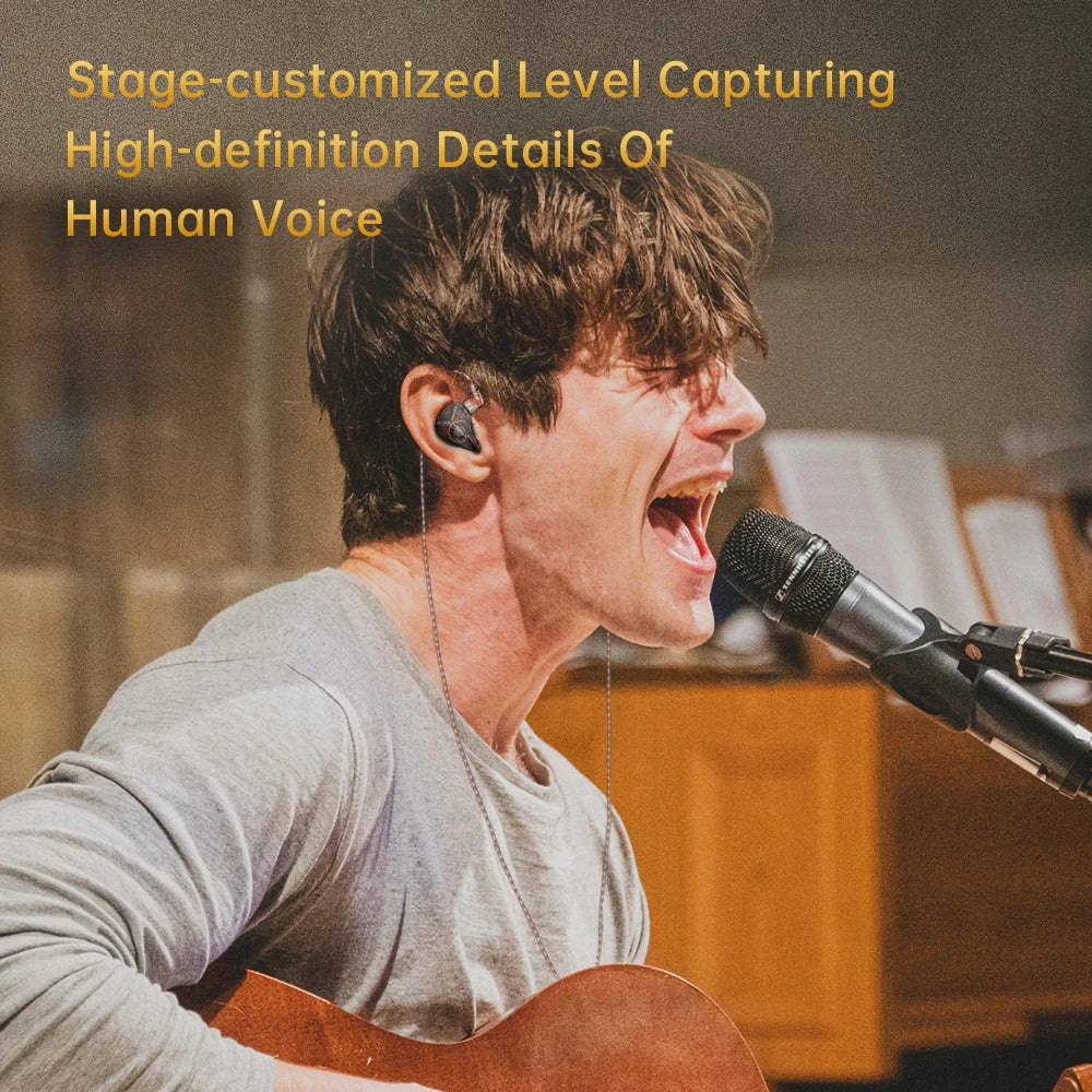 The Voltray Vault CVJ KE S features a musician singing into a microphone while wearing in-ear monitors, highlighting sound qu