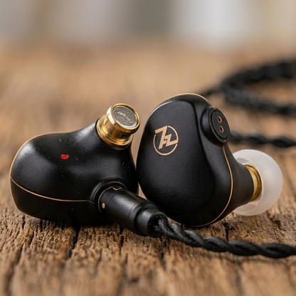 Linsoul 7HZ G1 in-ear monitors with a sleek black design, gold accents, and detachable cable on a wooden surface.