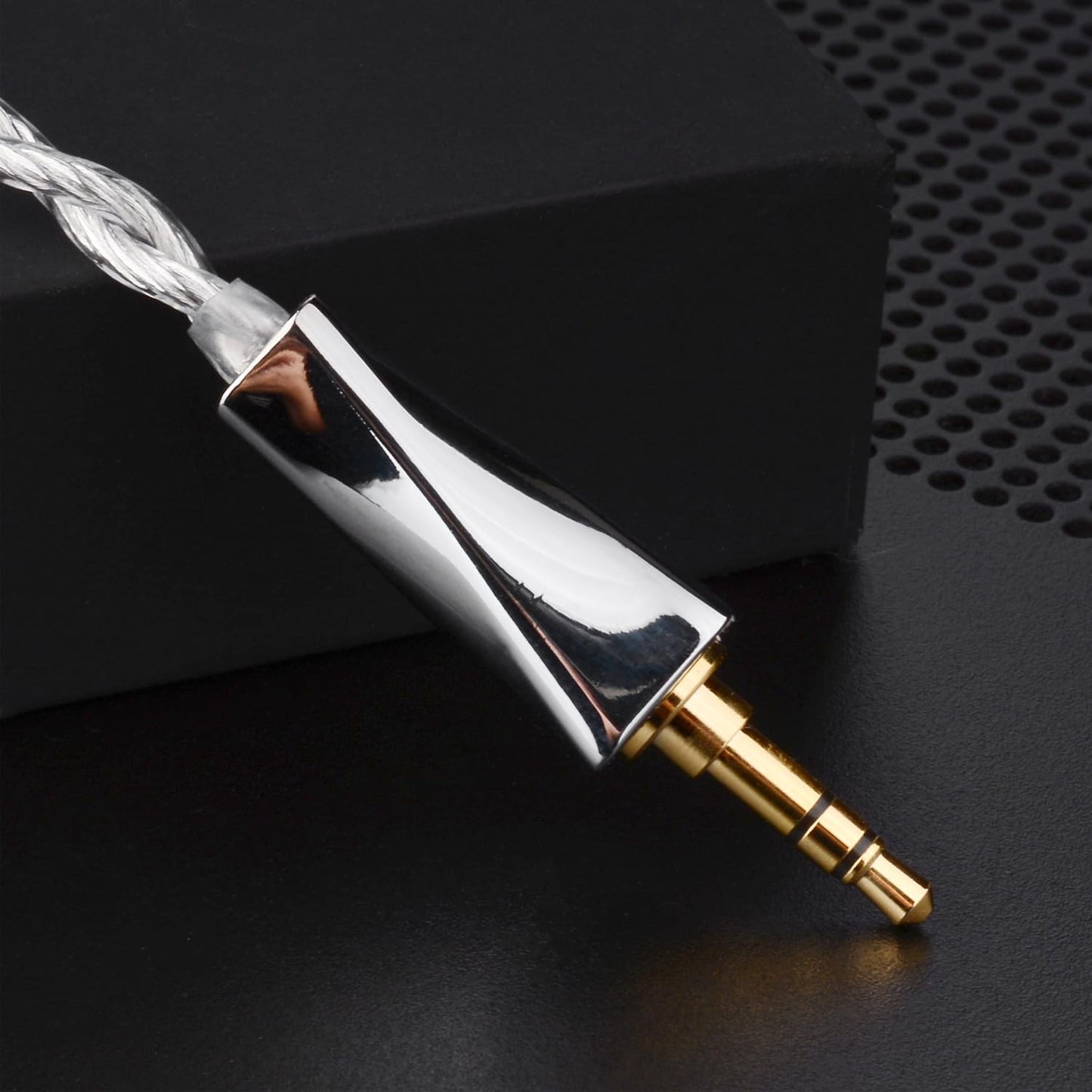 FAAEAL IEM Cable by THE VOLTRAY VAULT featuring a shiny silver connector and a gold-plated 3.5mm jack.