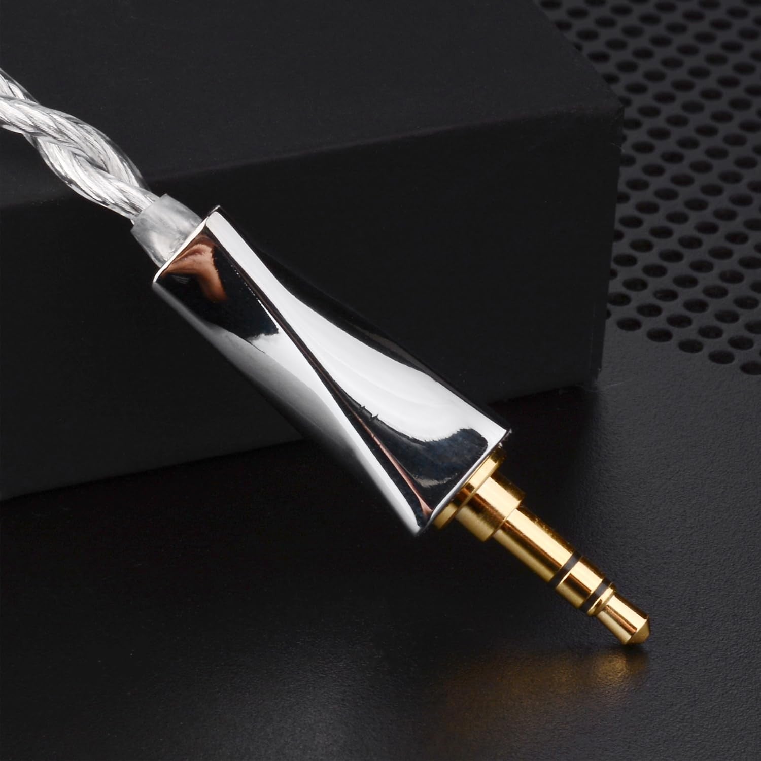 FAAEAL IEM Cable by THE VOLTRAY VAULT featuring a shiny silver connector and a gold-plated 3.5mm jack.