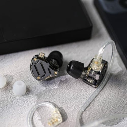 KZ ZS10 PRO 2 in-ear wired earphones with clear black housing and detachable transparent cable on a textured surface.